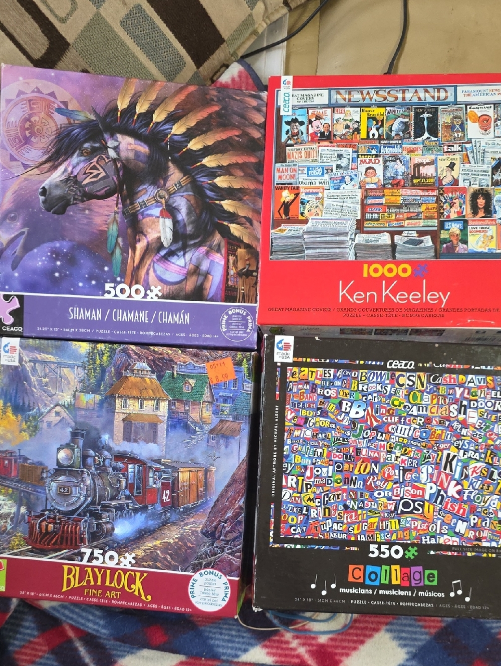 Lot of 4 Ceaco Puzzles No Missing Pieces